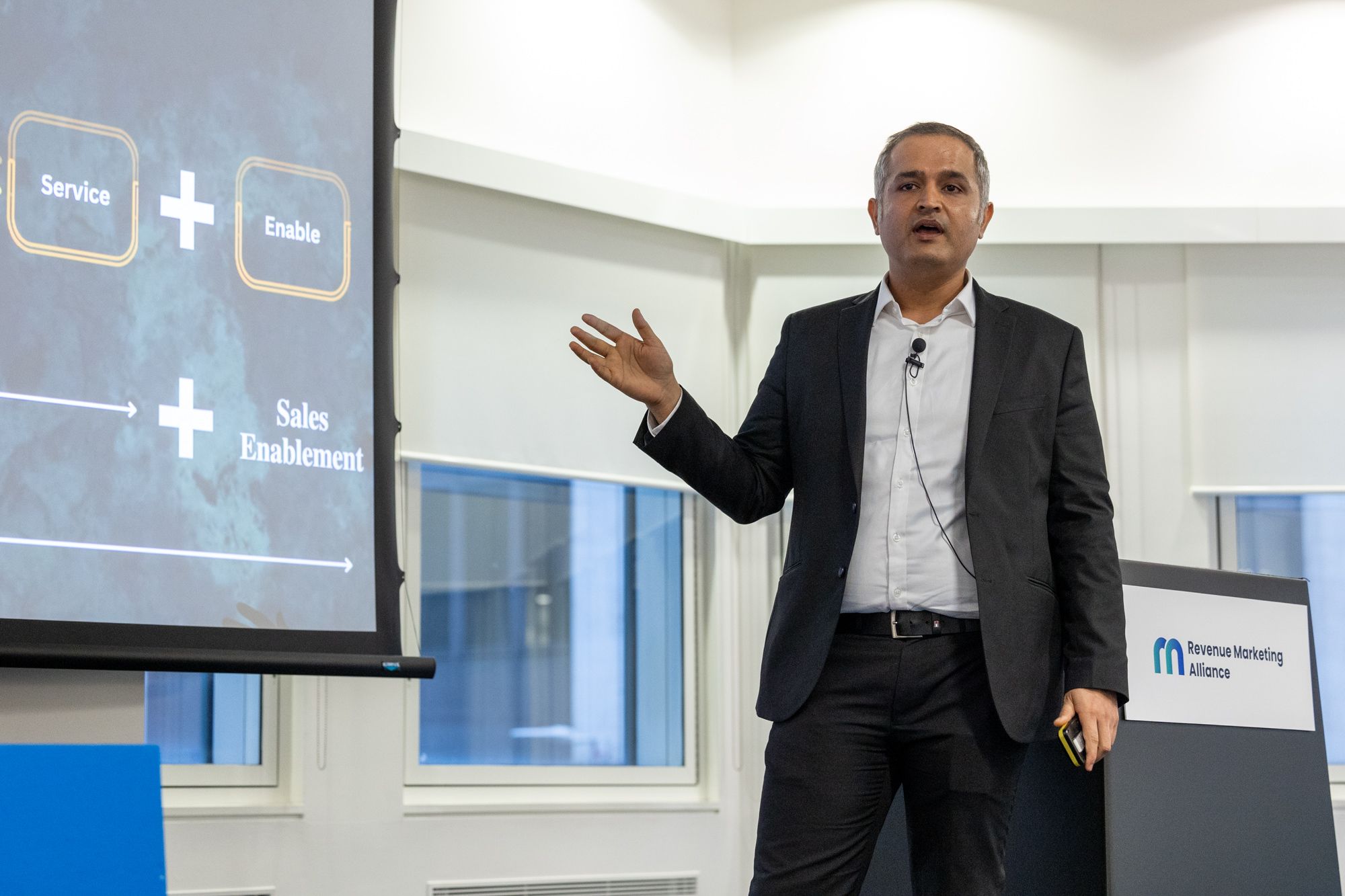 Vinay Khana presenting at the Revenue Marketing Summit, London